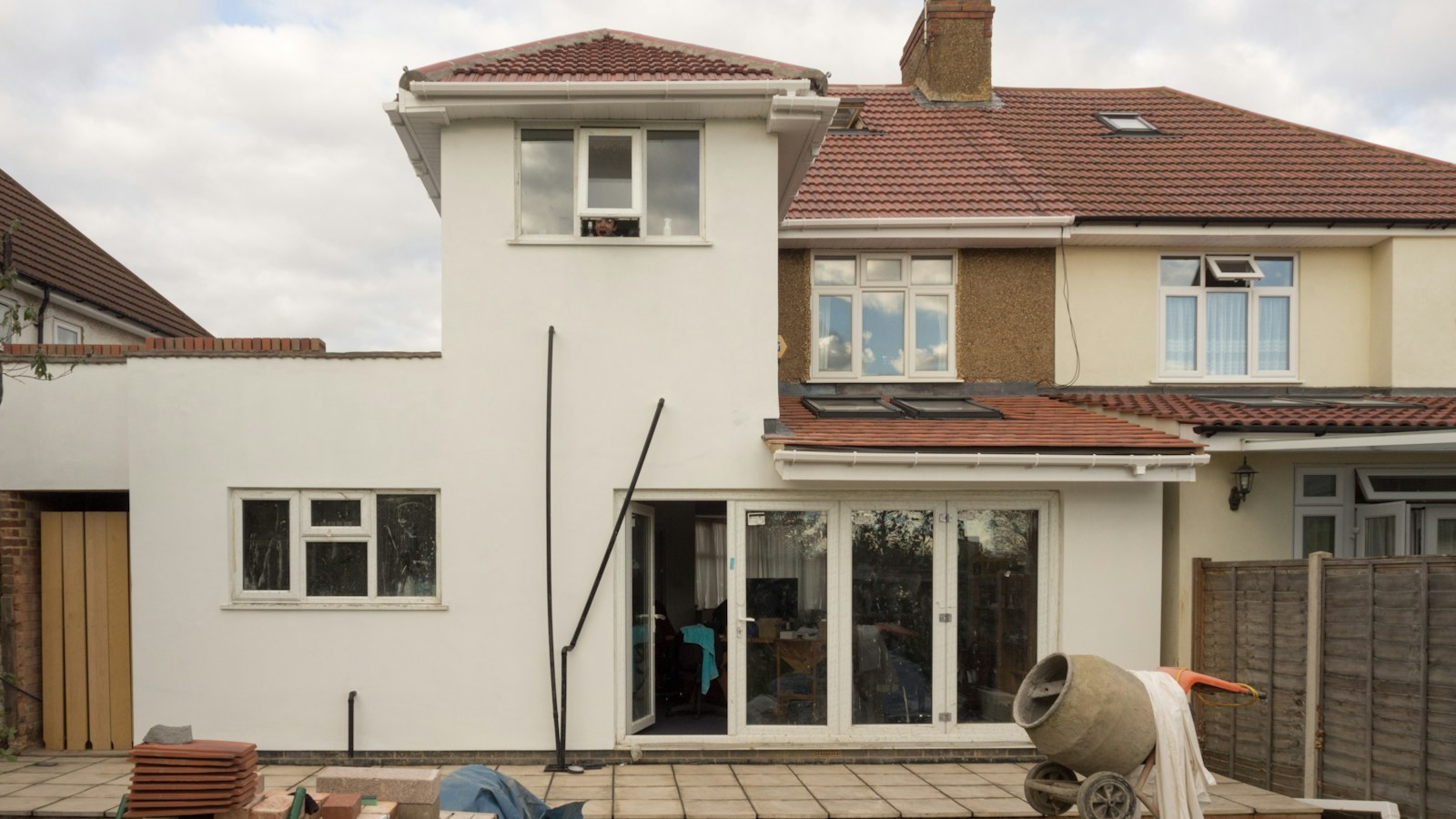 Illustrative photo of a finished house exterior with new windows